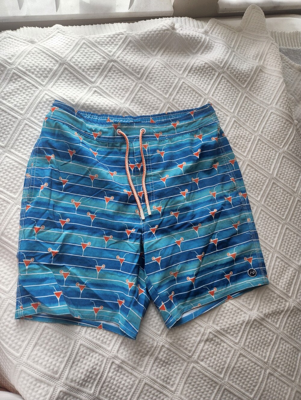 johnnie-O Blue Striped Swim Shorts with Orange Cocktail Motif